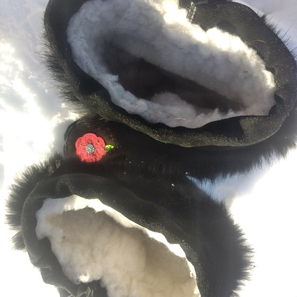 Women's mucklucks never worn.